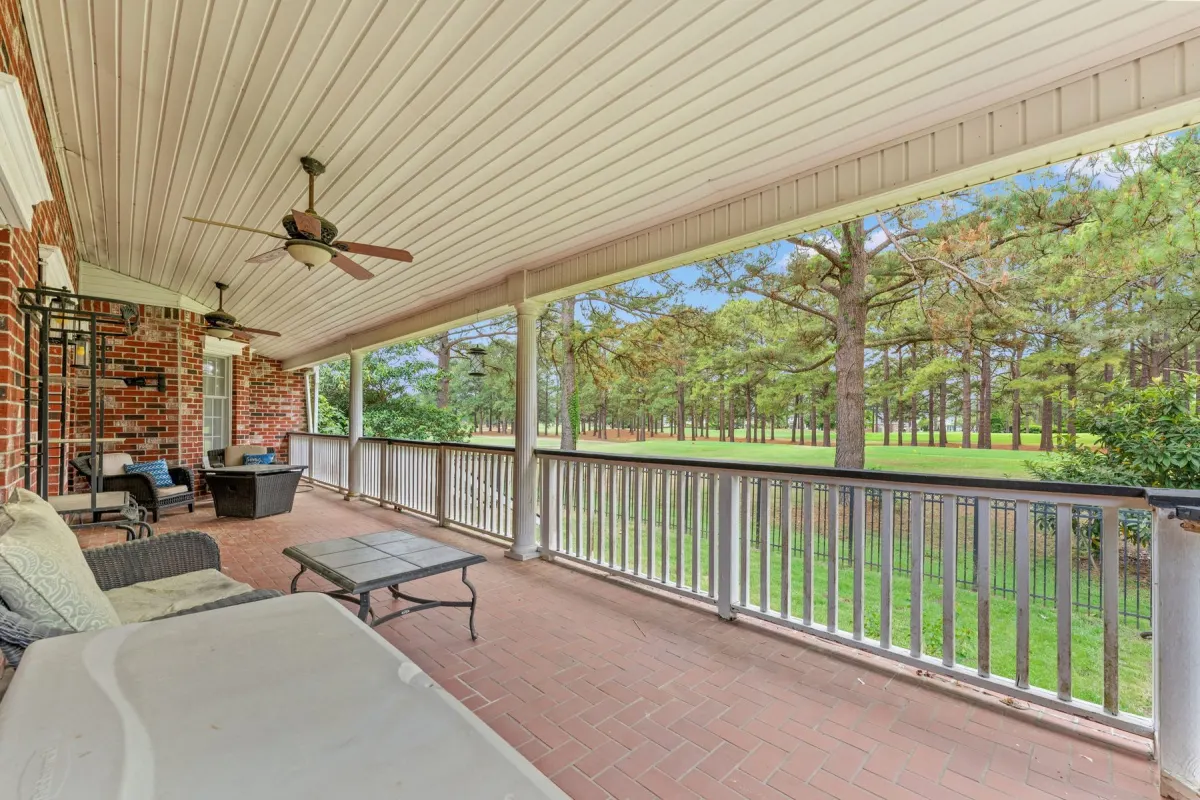 Large covered back porch overlooking the golf course